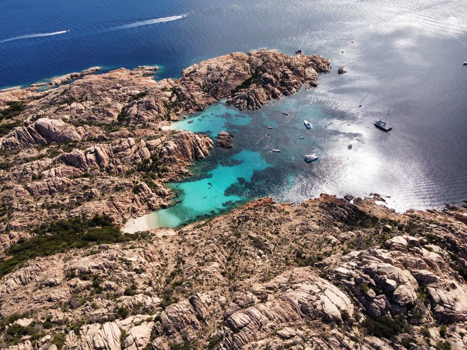 The Sardinian coast from above, turquoise water against pale rock
