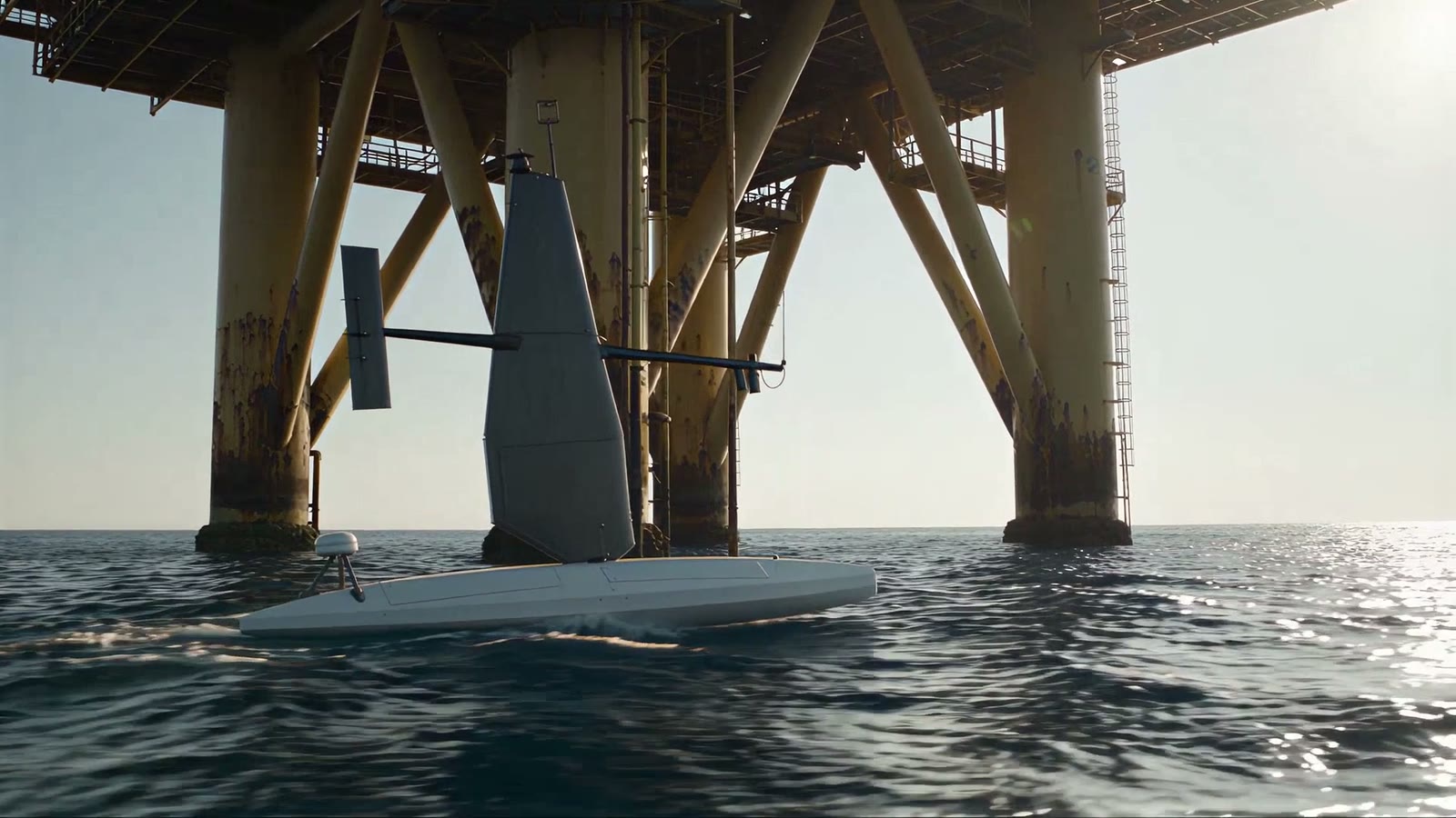 The sail drone under the legs of an offshore platform